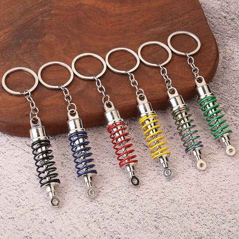 Car shock absorber pendant figure key chain