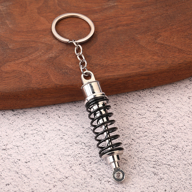 Car shock absorber pendant figure key chain