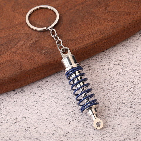 Car shock absorber pendant figure key chain