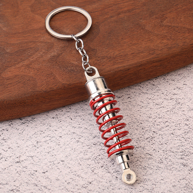 Car shock absorber pendant figure key chain