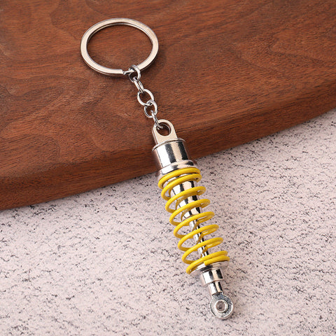 Car shock absorber pendant figure key chain