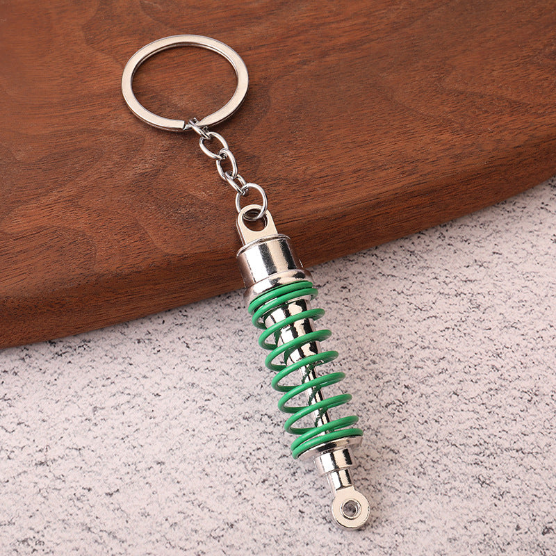 Car shock absorber pendant figure key chain