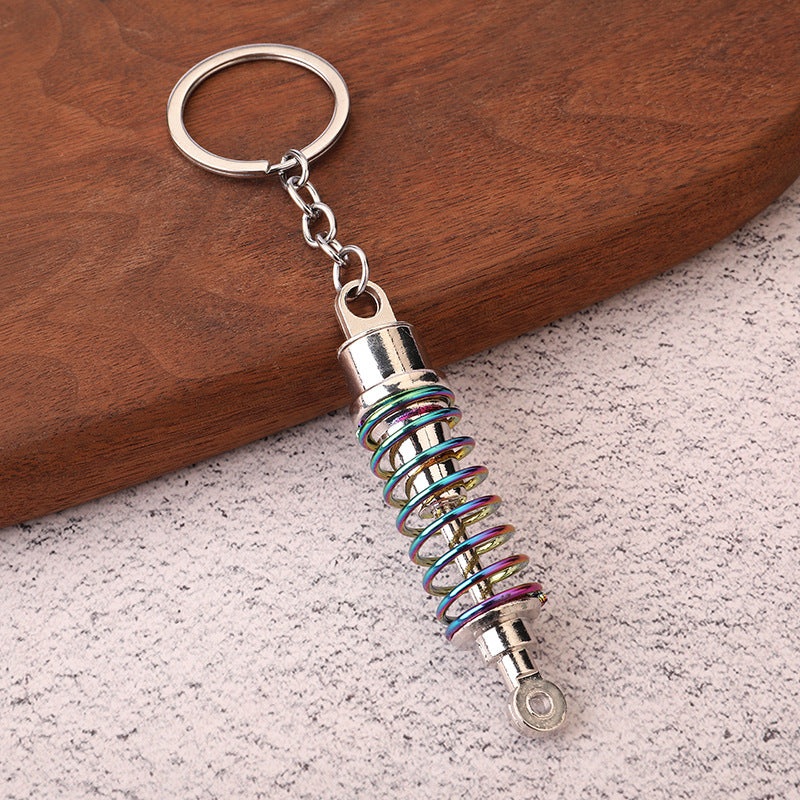 Car shock absorber pendant figure key chain